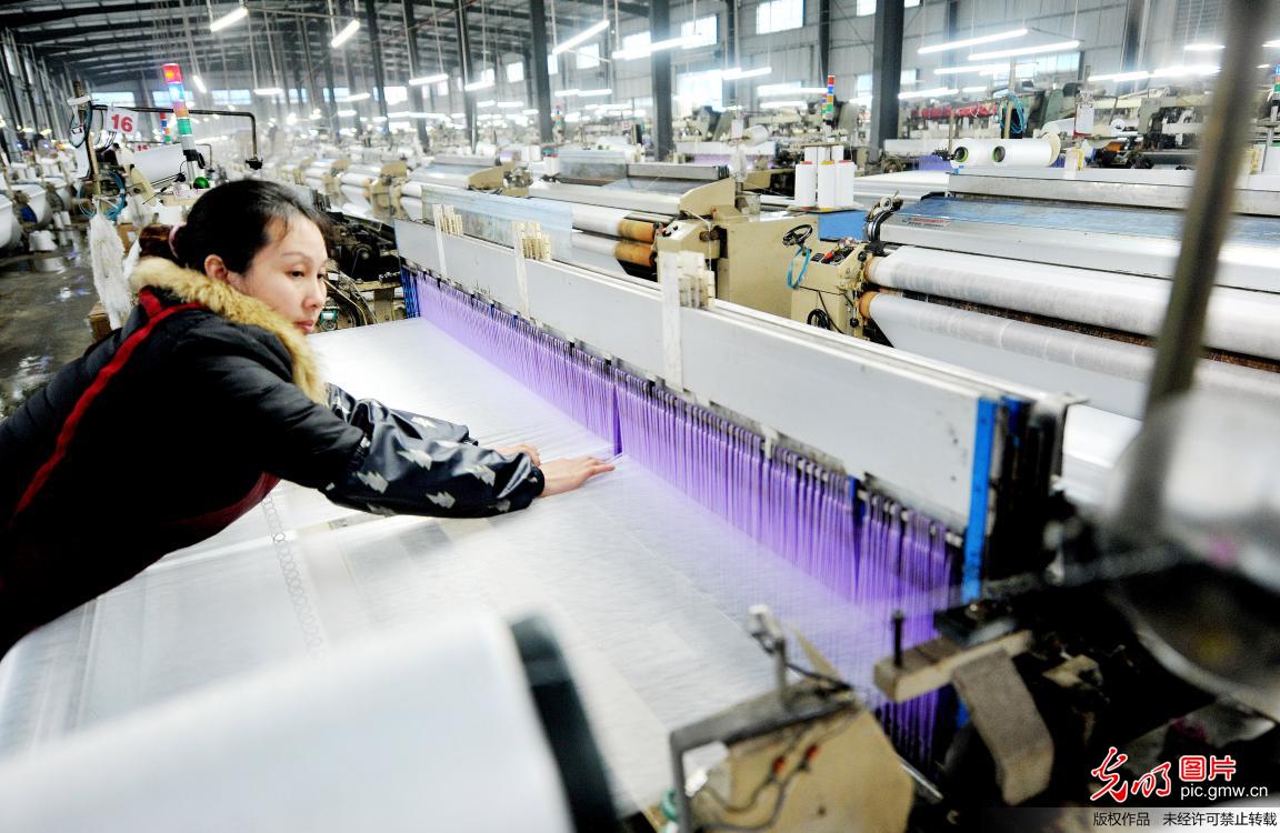 江西德兴：新技术助力纺织出口