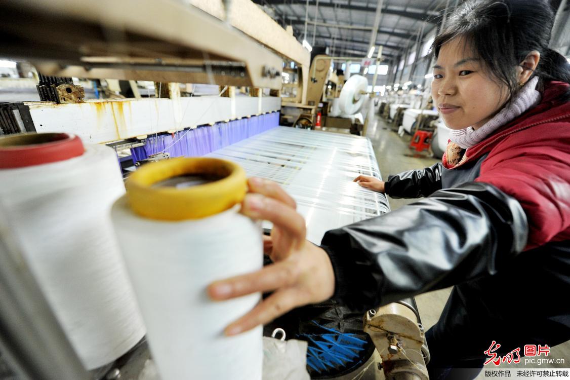 江西德兴：新技术助力纺织出口