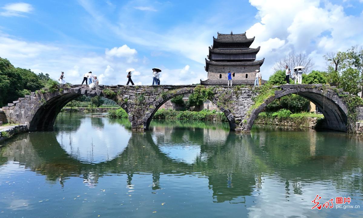古村景美引客来